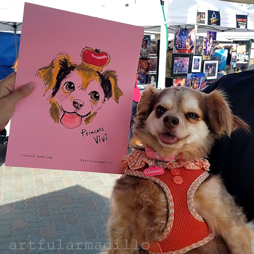 Princess Vivi poses with her caricature
